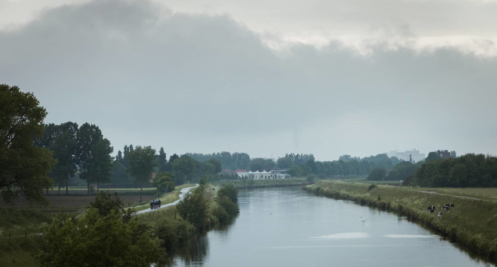 Cruising along the River Scheldt - (c) Rapha CCC RVV